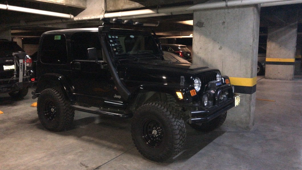 Mammoth D Window Black Wagon Wheel Edition Steel Wheel; 15x8; -19mm Offset (97-06 Jeep Wrangler TJ)
