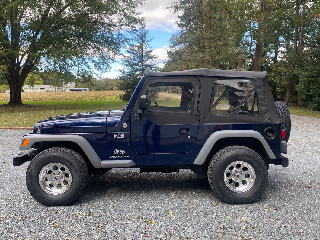 Mammoth 8 Aluminum Polished Wheel; 15x8; -19mm Offset (97-06 Jeep Wrangler TJ)