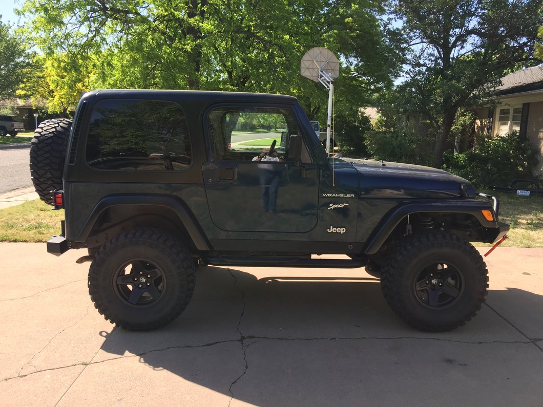 Mammoth Boulder Black 15x8 Wheel and Mickey Thompson Baja MTZ 33X12.50R15 Tire Kit (87-06 Jeep Wrangler YJ & TJ)